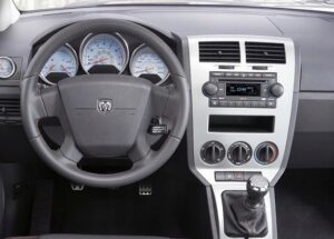 24cb92669d62f17e8956366a488bcb3b.jpg RAMKA DO RADIA NAVI 10 CALI DODGE CALIBER 2006-11